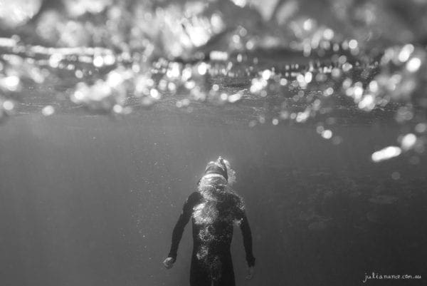 underwater photography of Man blowing Bubbles