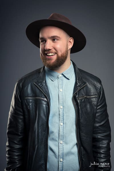 Studio portrait of a musician in a cowboy hat