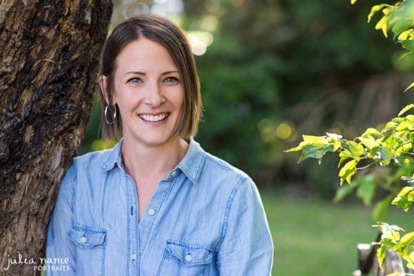 Woman standing outside amongst tree and greenery - Melbourne personal branding and headshot photography - linkedin headshots and corporate headshots