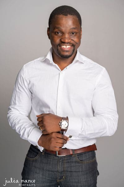 Melbourne corporate headshot photography and personal branding portraits. Man smiles for promotional portraiture