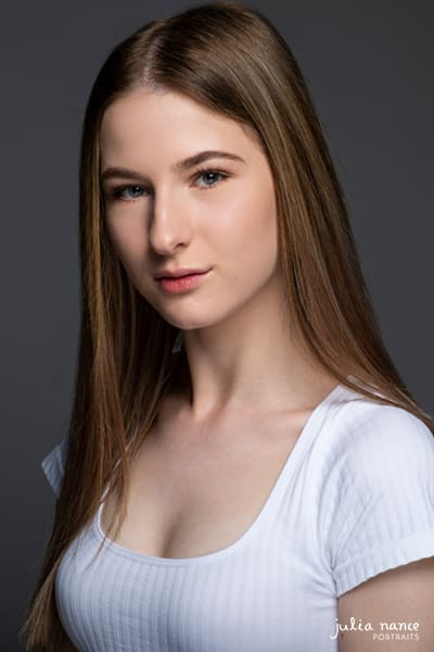 Melbourne actor headshot of young girl in studio on a dark grey background