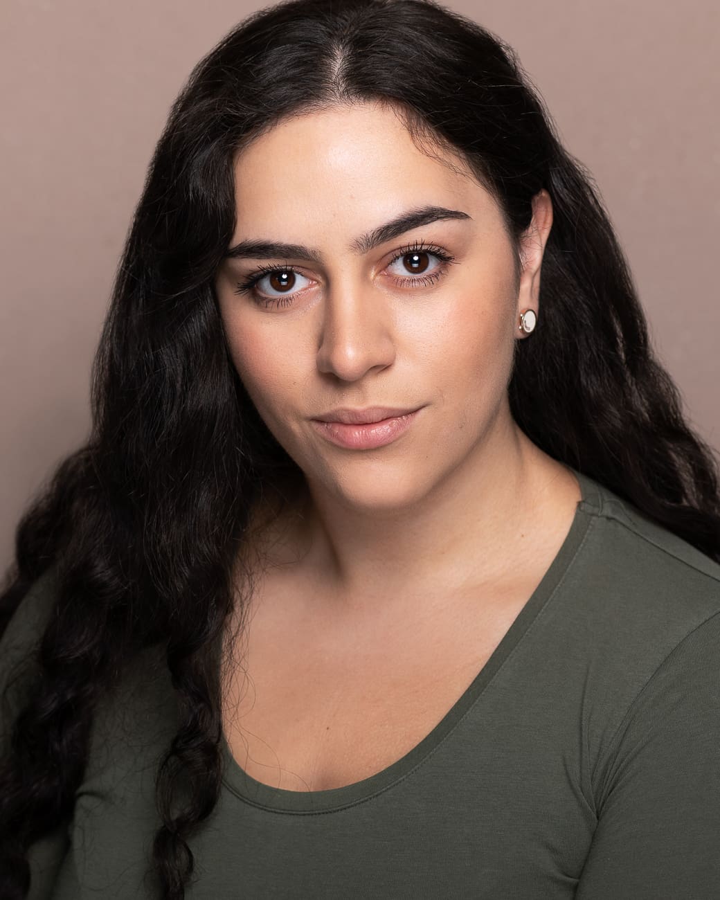 Studio actor headshot of melbourne actress with a serious expression