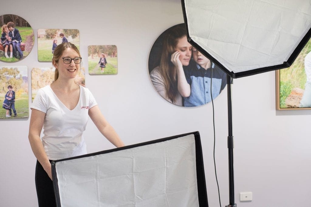 Julia photographing in her studio.