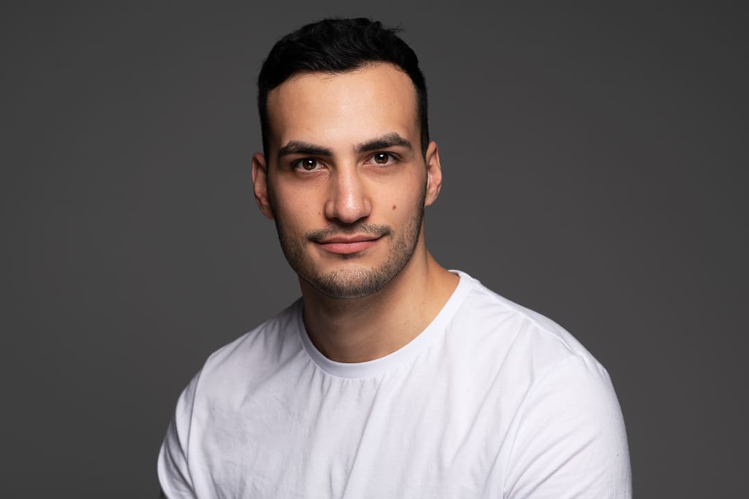 headshot of melbourne dancer and performer with a serious expression.