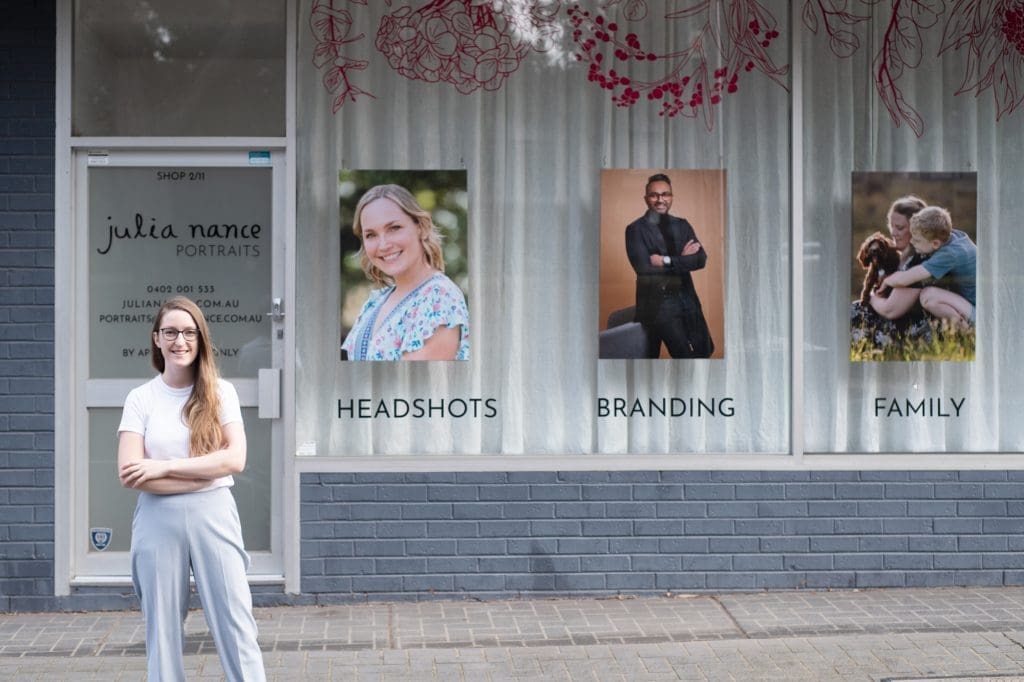 Julia Nance standing outside her portrait studio in Melbourne