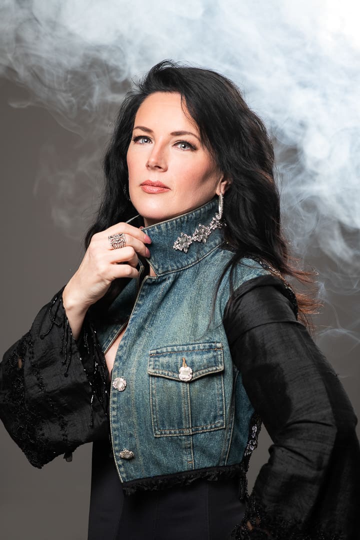 Personal branding headshot of melbourne creative business owner, taken in studio with smoke for theatrics.