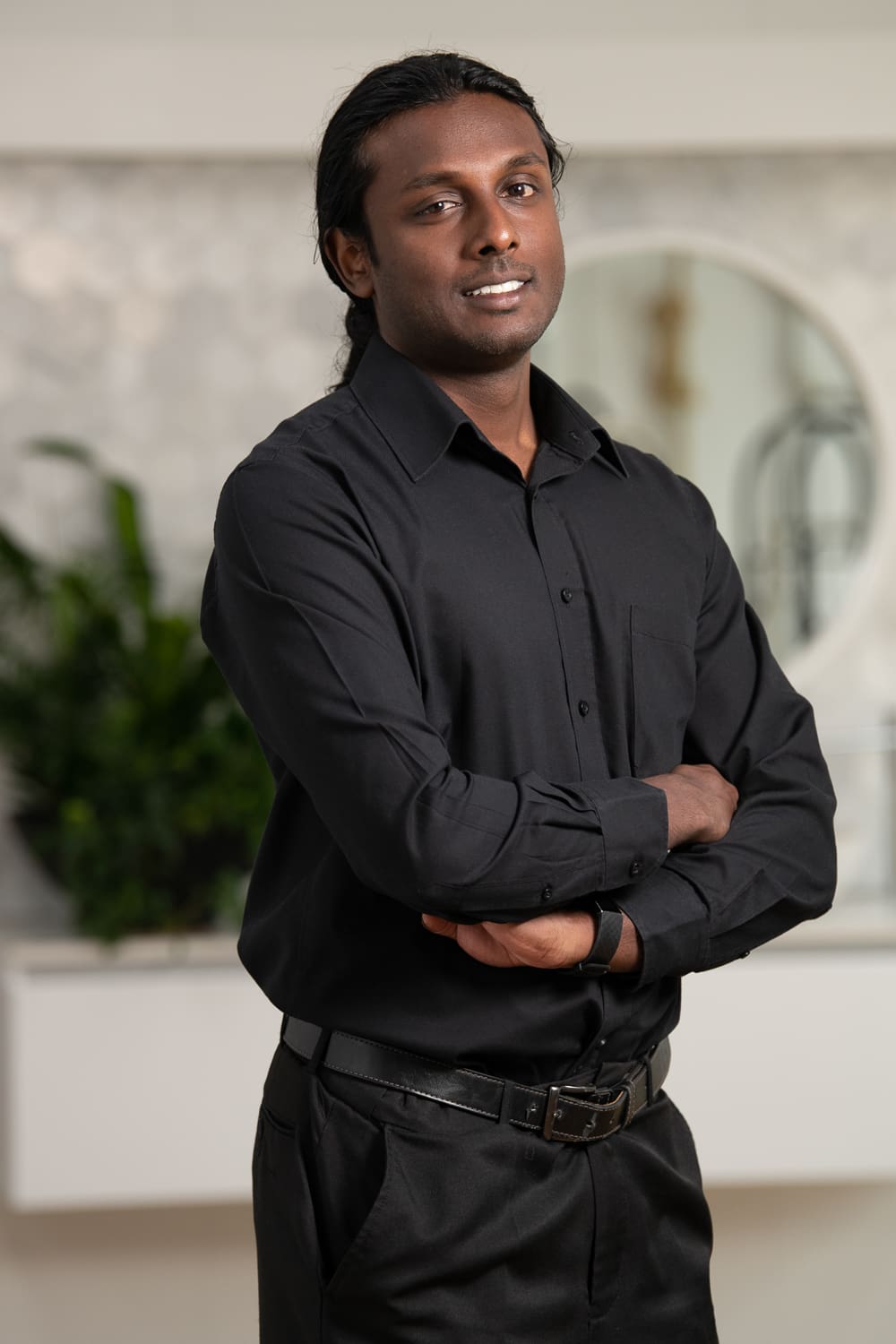 Melbourne team headshot photography. Branding portrait with a blurred background captured in workplace.